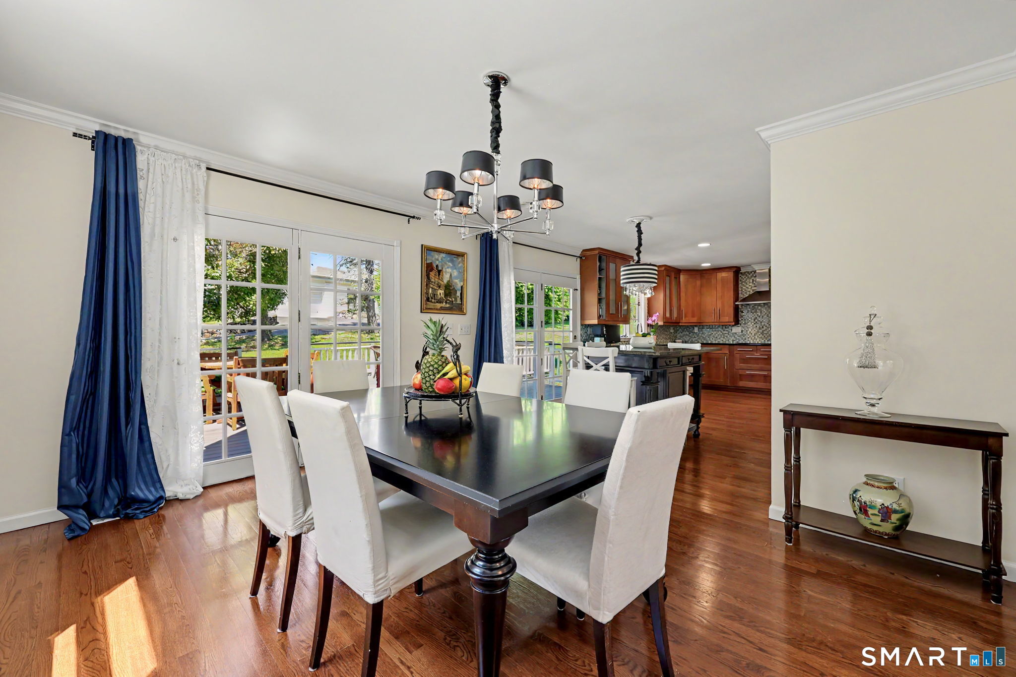 1100 Stillwater Road Stamford, CT 06902 - Photo 10 of 40 Dining Room with French Door to Deck and Backyard