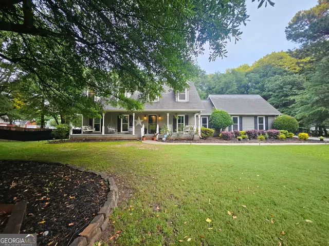 a view of outdoor space yard and swimming pool