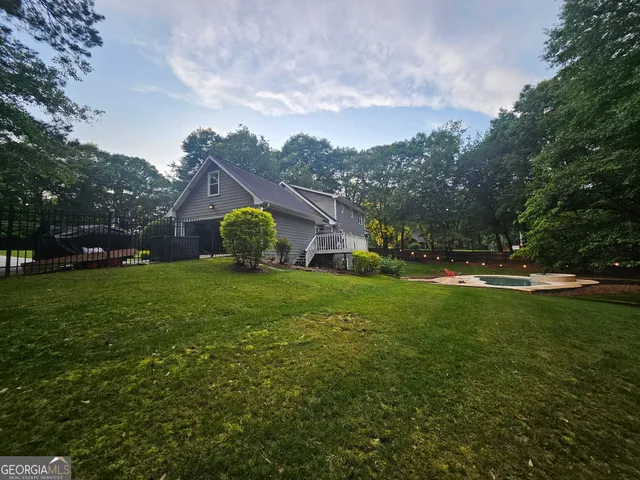 a view of a hallway with staircase