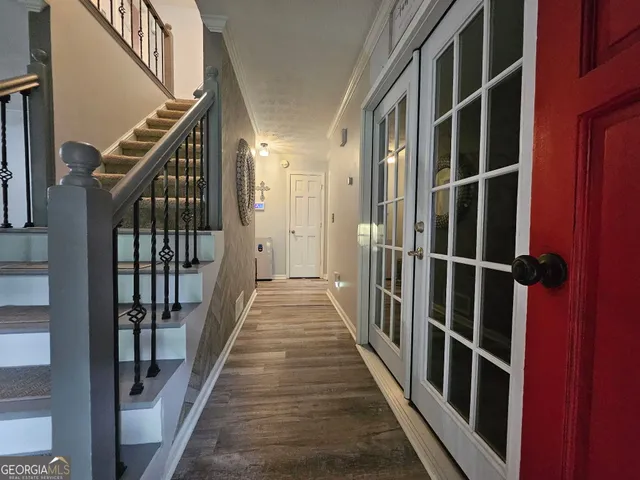 a bathroom with a tub a sink and a shower