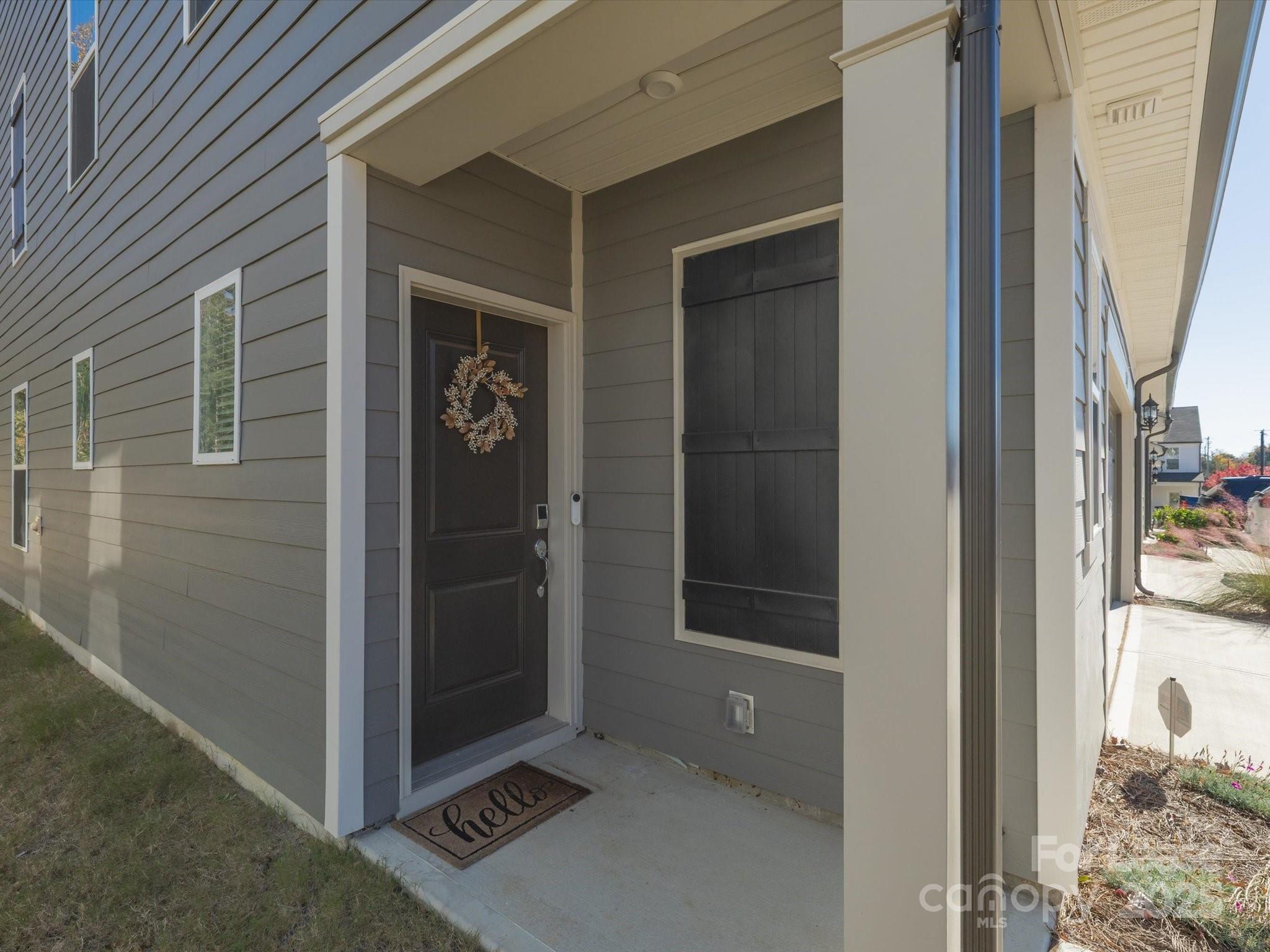 13124 Rover Street Charlotte, NC 28273 - Photo 3 of 46 a view of a bathroom with a door