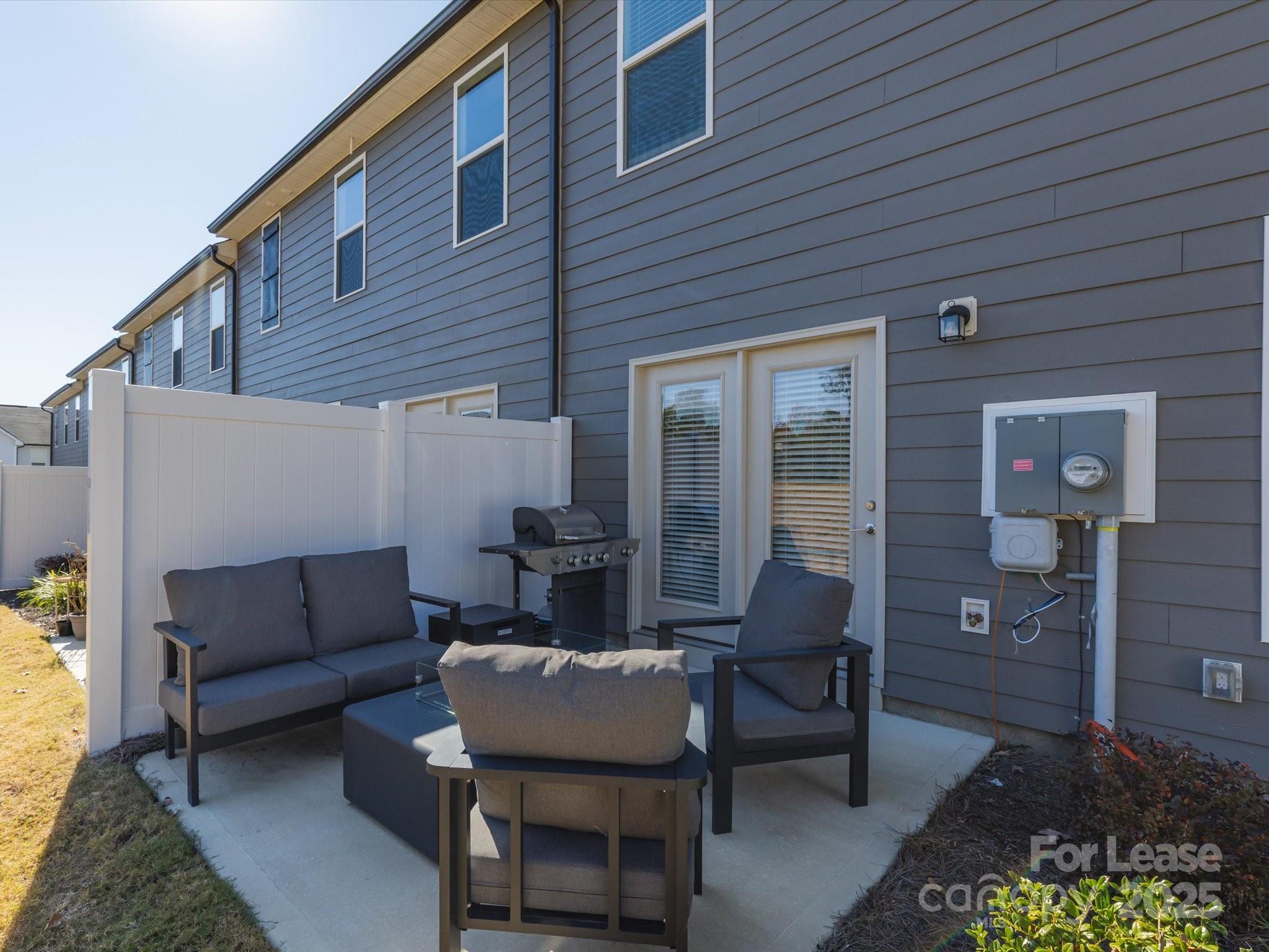 13124 Rover Street Charlotte, NC 28273 - Photo 42 of 46 a outdoor living space with furniture