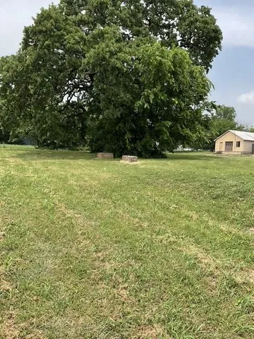 a view of outdoor space and yard