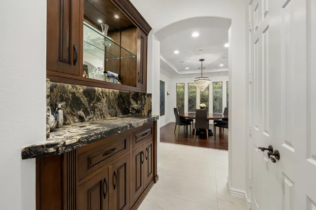 a view of a swimming pool with lounge chair