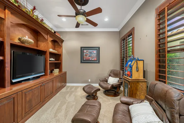 a kitchen with granite countertop a stove and cabinets