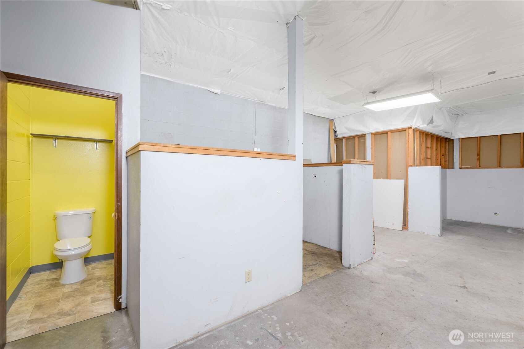 445 West Washington Street Sequim, WA 98382 - Photo 18 of 27 a view of a kitchen with a refrigerator and a sink