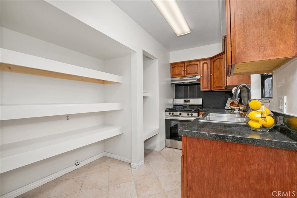 19855 Coventry Lane Huntington Beach, CA 92646 - Photo 15 of 55 Large pantry shelves.