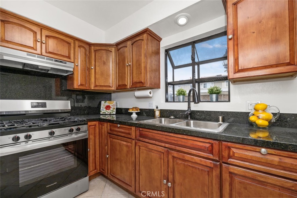 19855 Coventry Lane Huntington Beach, CA 92646 - Photo 16 of 55 Plenty of cabinetry for all your cooking supplies.