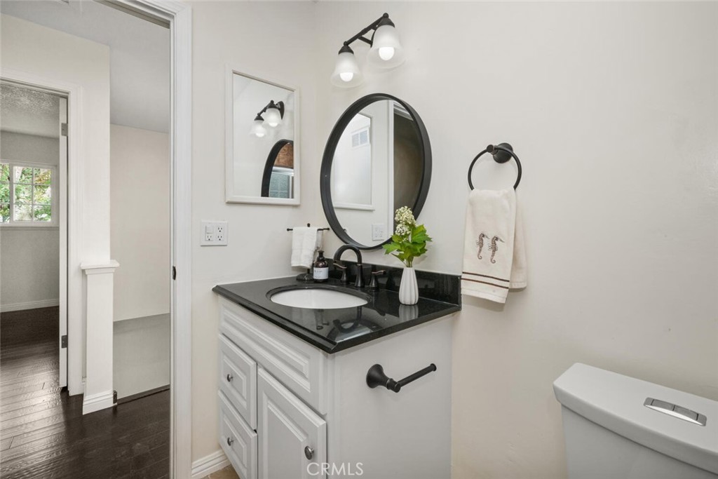 19855 Coventry Lane Huntington Beach, CA 92646 - Photo 28 of 55 New finishes compliment the vanity and complete the design.