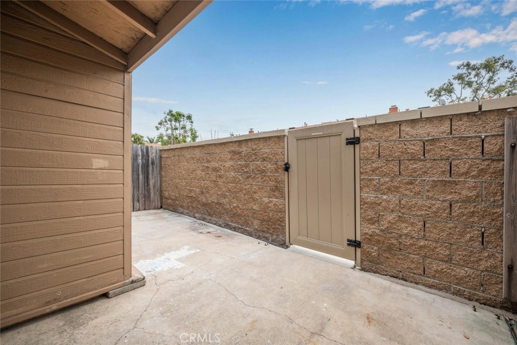 19855 Coventry Lane Huntington Beach, CA 92646 - Photo 36 of 55 Private enclosed patio for outdoor living or a furry friend.