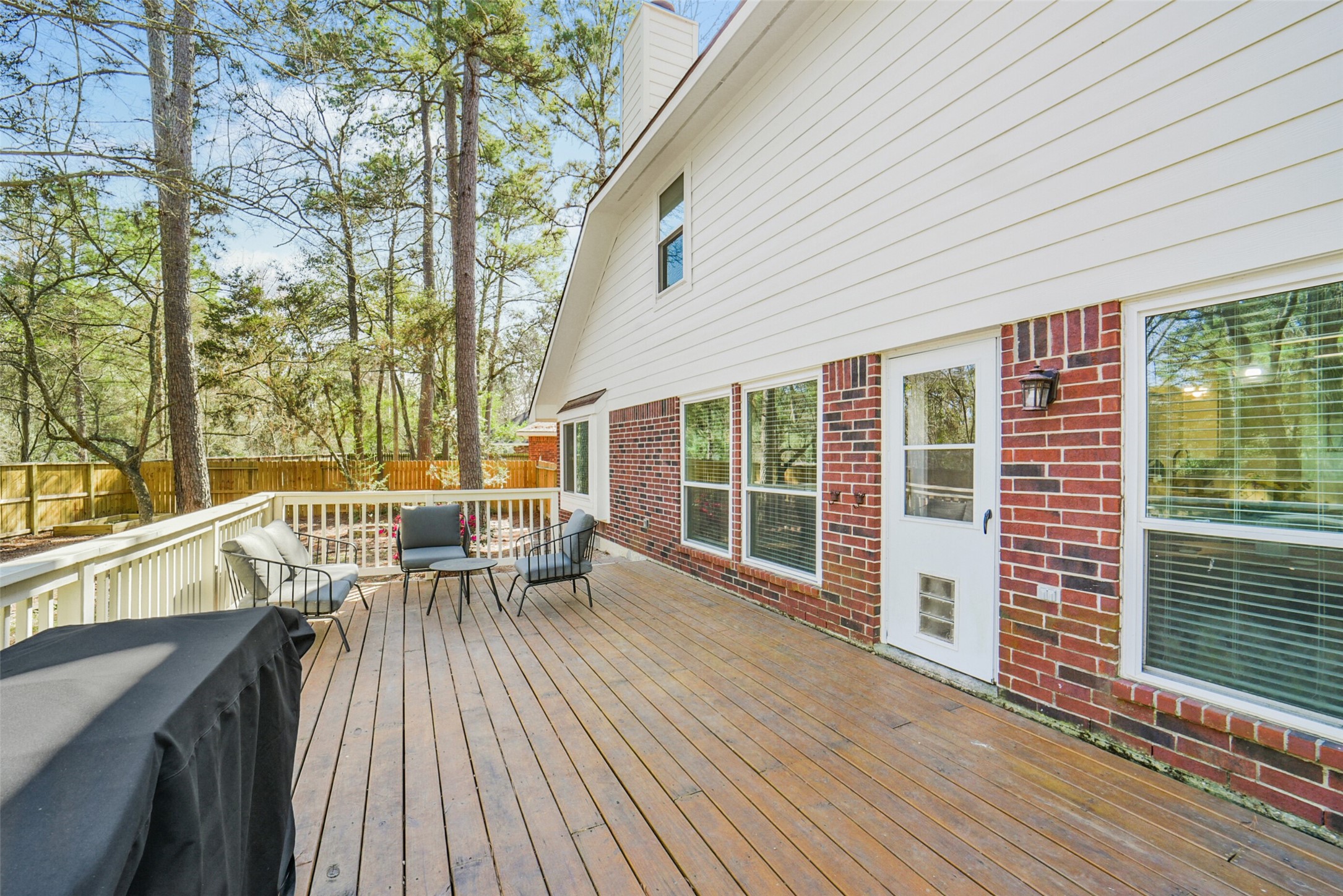 38 Tallow Hill Place Spring, TX 77382 - Photo 6 of 50 a balcony with wooden floor and furniture