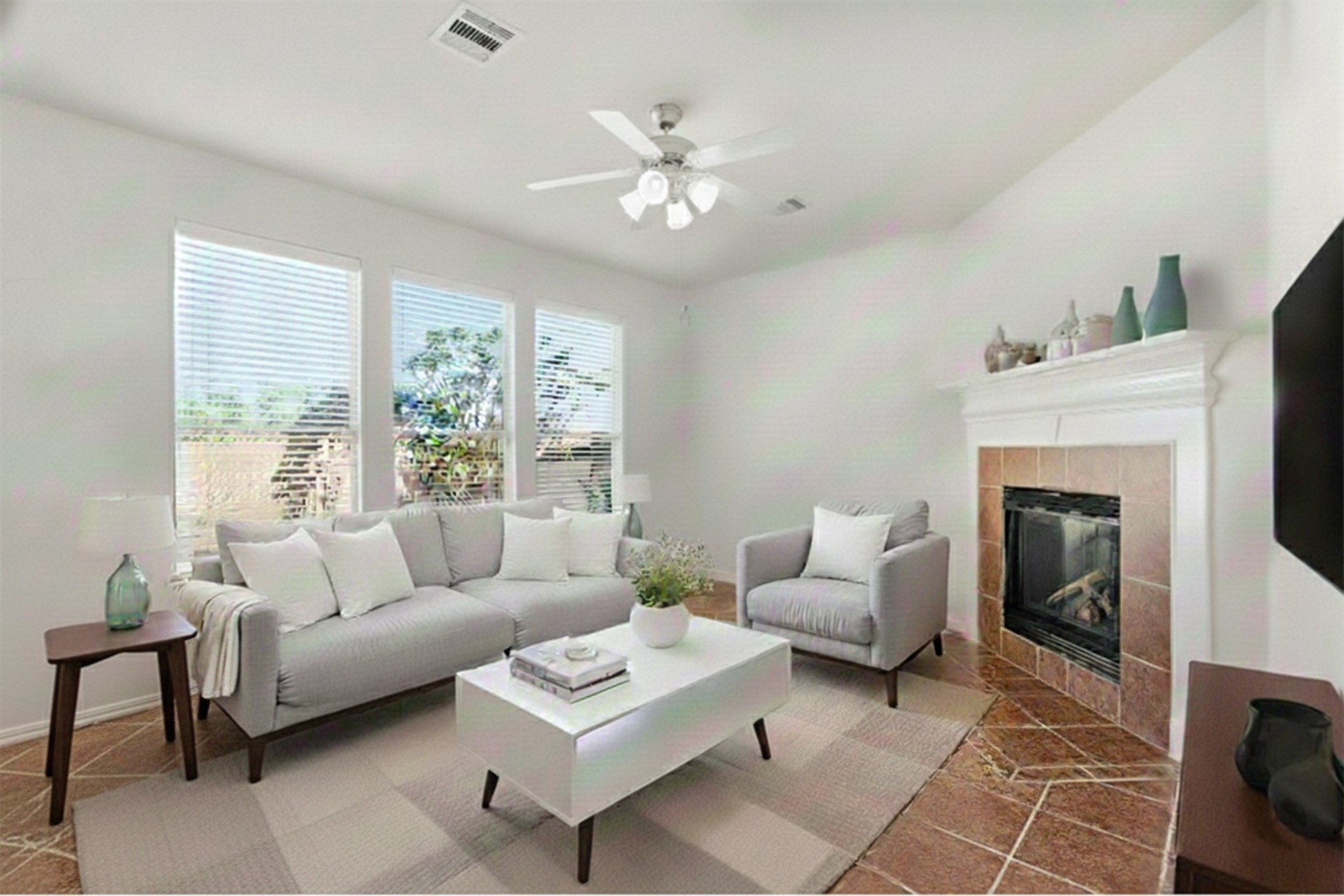 a living room with furniture and a fireplace
