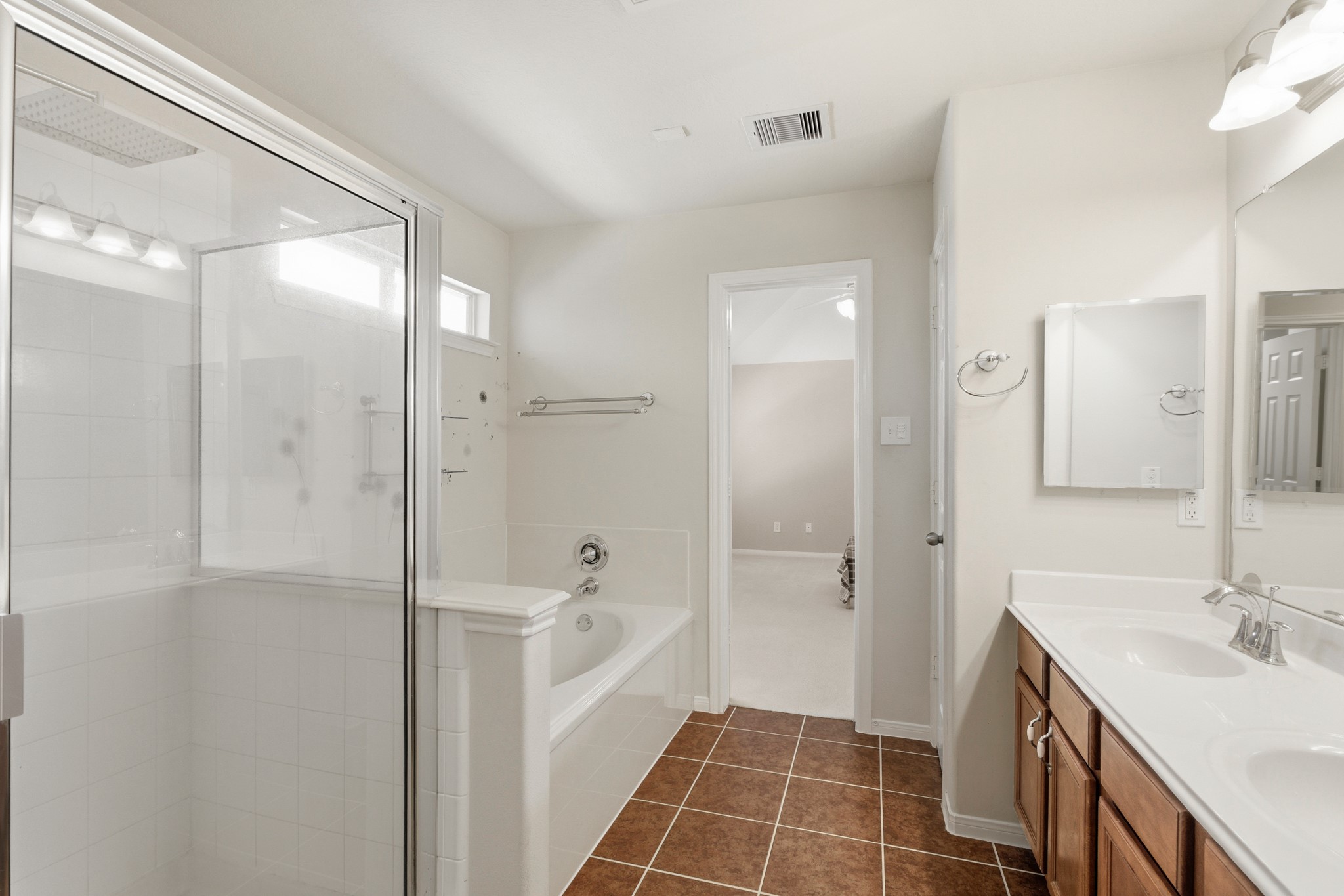 3214 Vinca Ranch Drive Katy, TX 77494 - Photo 14 of 26 a bathroom with a sink a toilet and shower