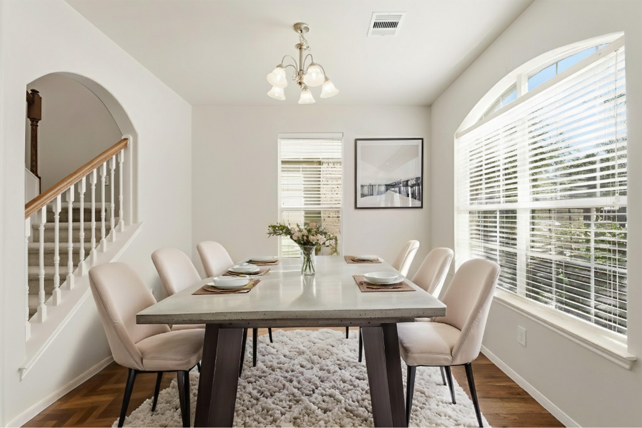 3214 Vinca Ranch Drive Katy, TX 77494 - Photo 4 of 26 Bright formal dining room with arched entryways, and large windows offering natural light.**Virtually Staged**