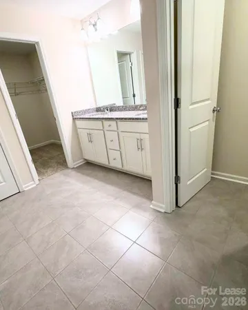 a view of a kitchen with cabinets
