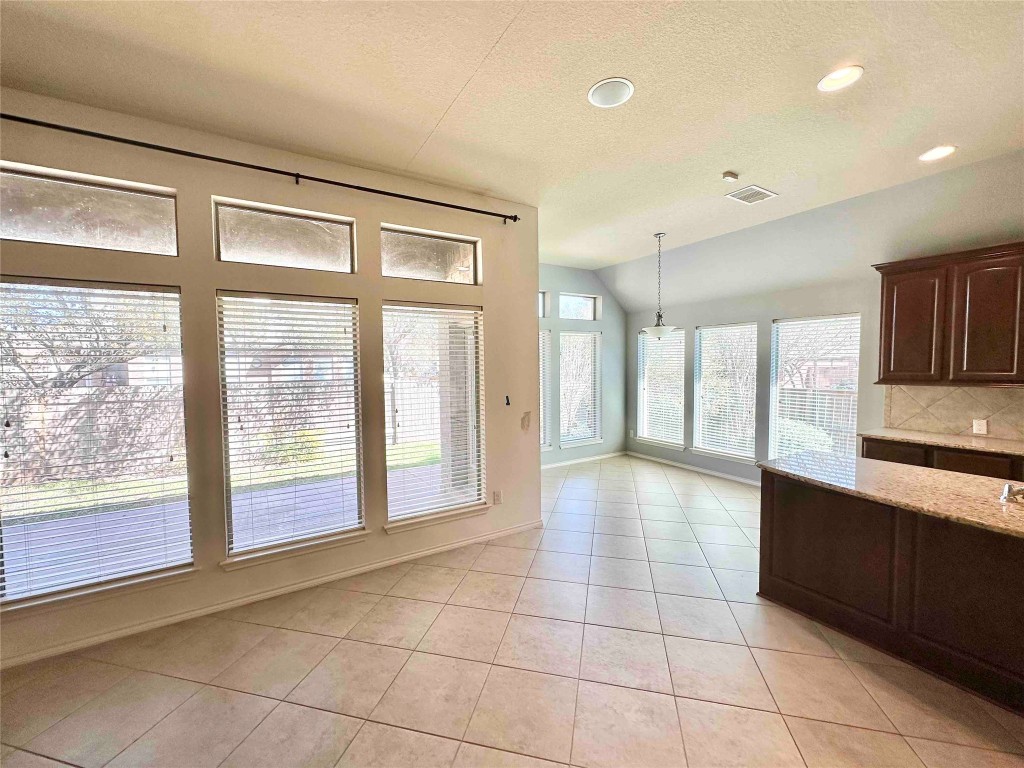 1801 Tall Chief Leander, TX 78641 - Photo 12 of 23 a view of an empty room with a window