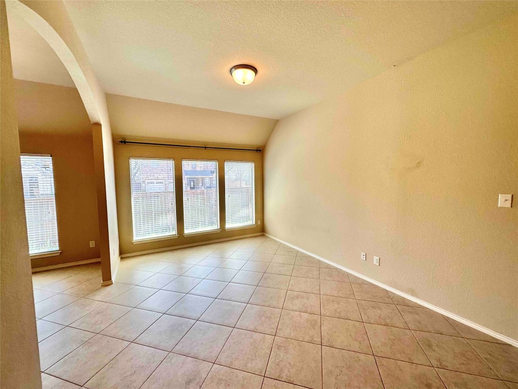 1801 Tall Chief Leander, TX 78641 - Photo 6 of 23 a view of an empty room with a window