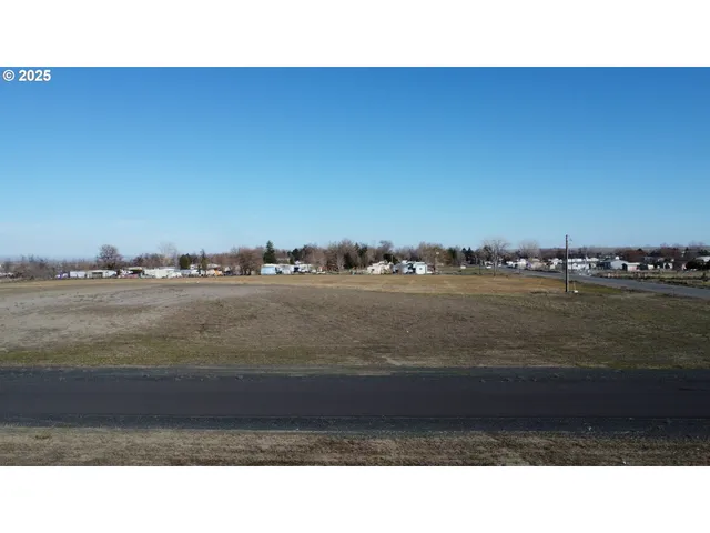 a black and white photo of a field