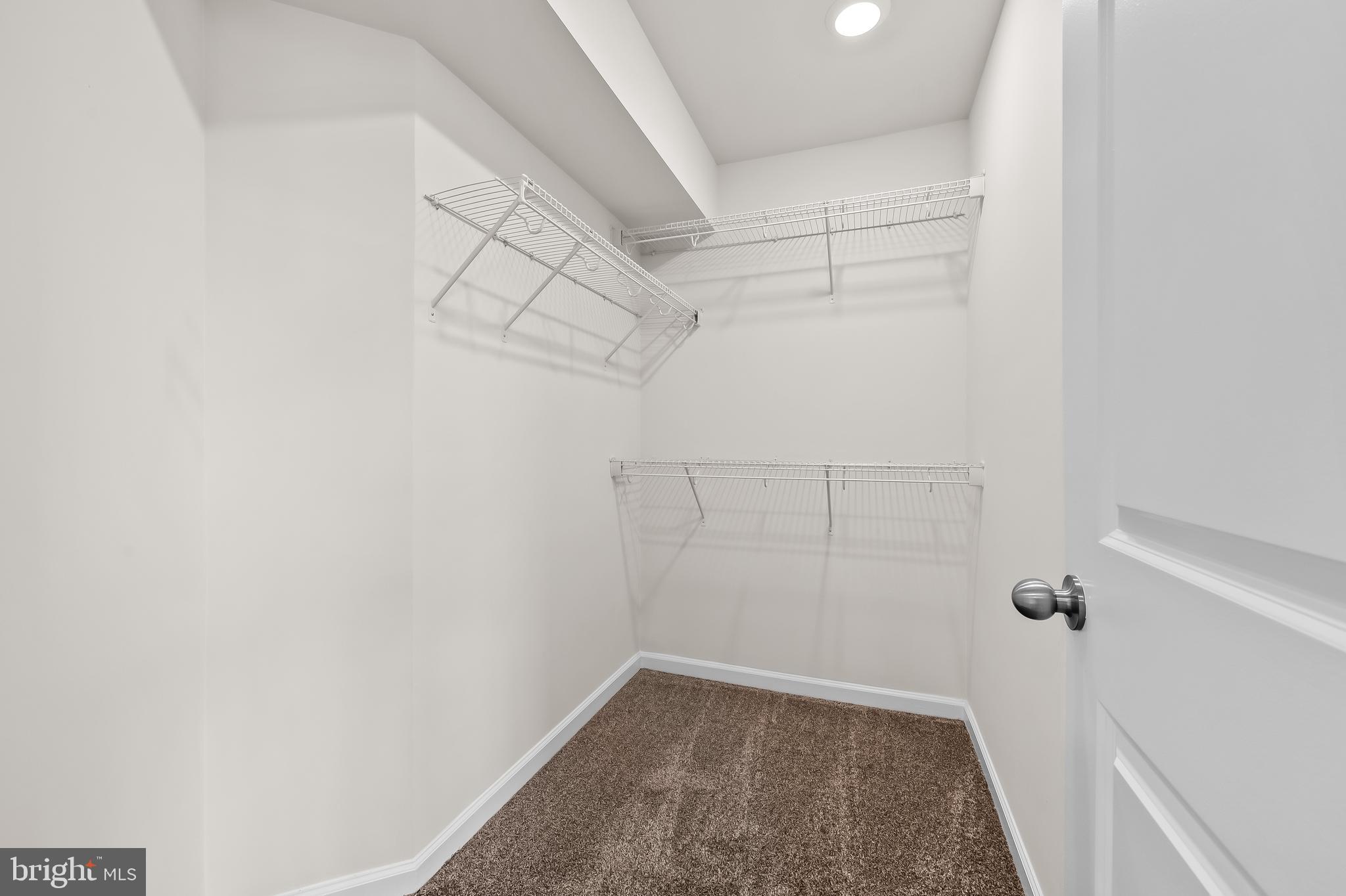 657 Mozart Way Baltimore, MD 21224 - Photo 12 of 39 a view of a room with racks on the wall