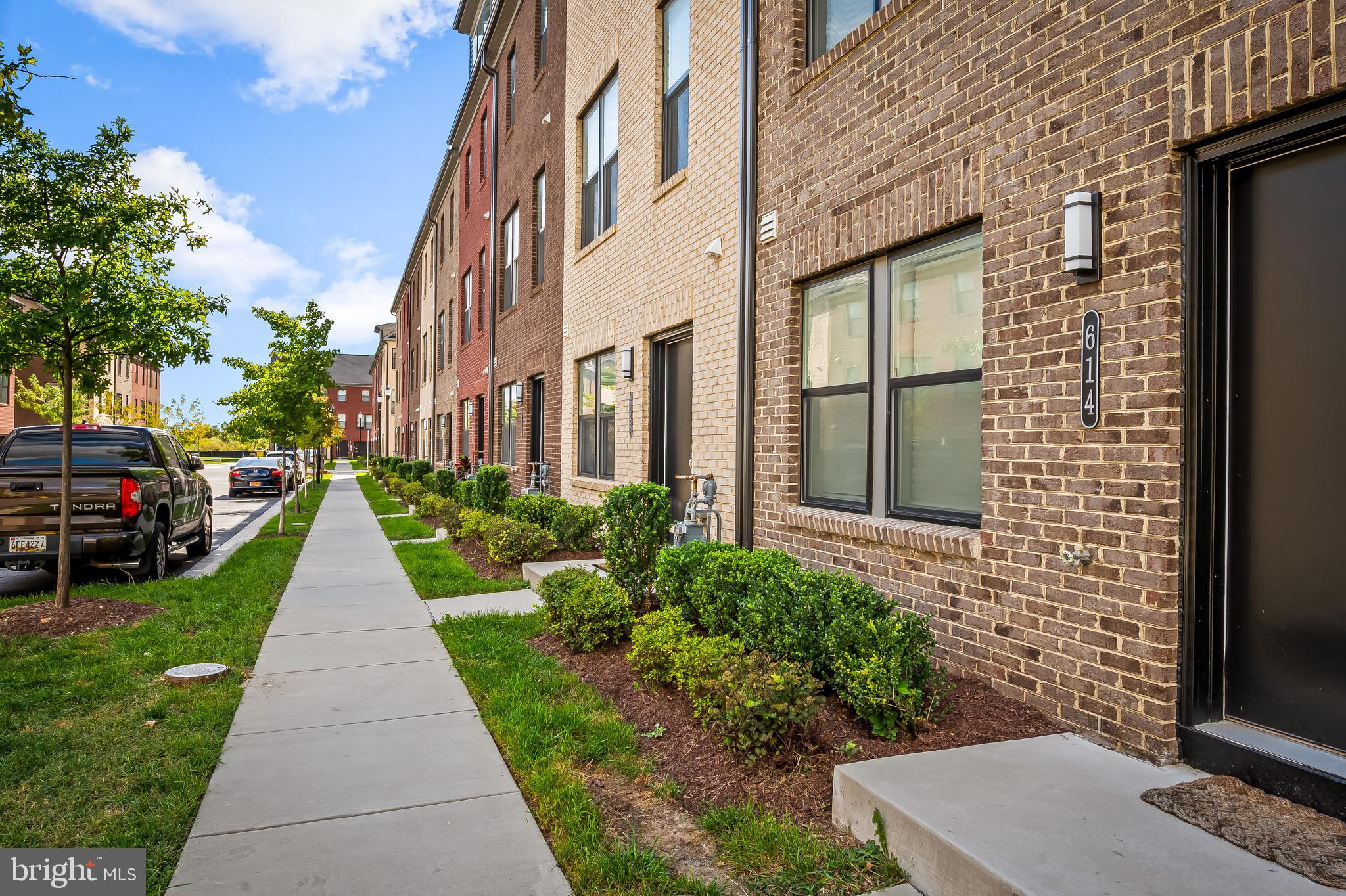657 Mozart Way Baltimore, MD 21224 - Photo 30 of 39 a view of a pathway with house on both side