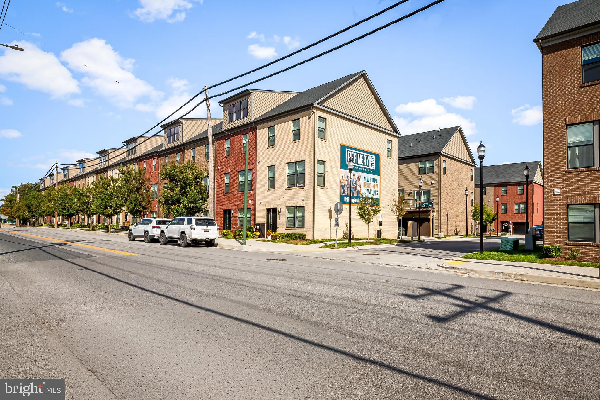 657 Mozart Way Baltimore, MD 21224 - Photo 35 of 39 front view of a building with a street