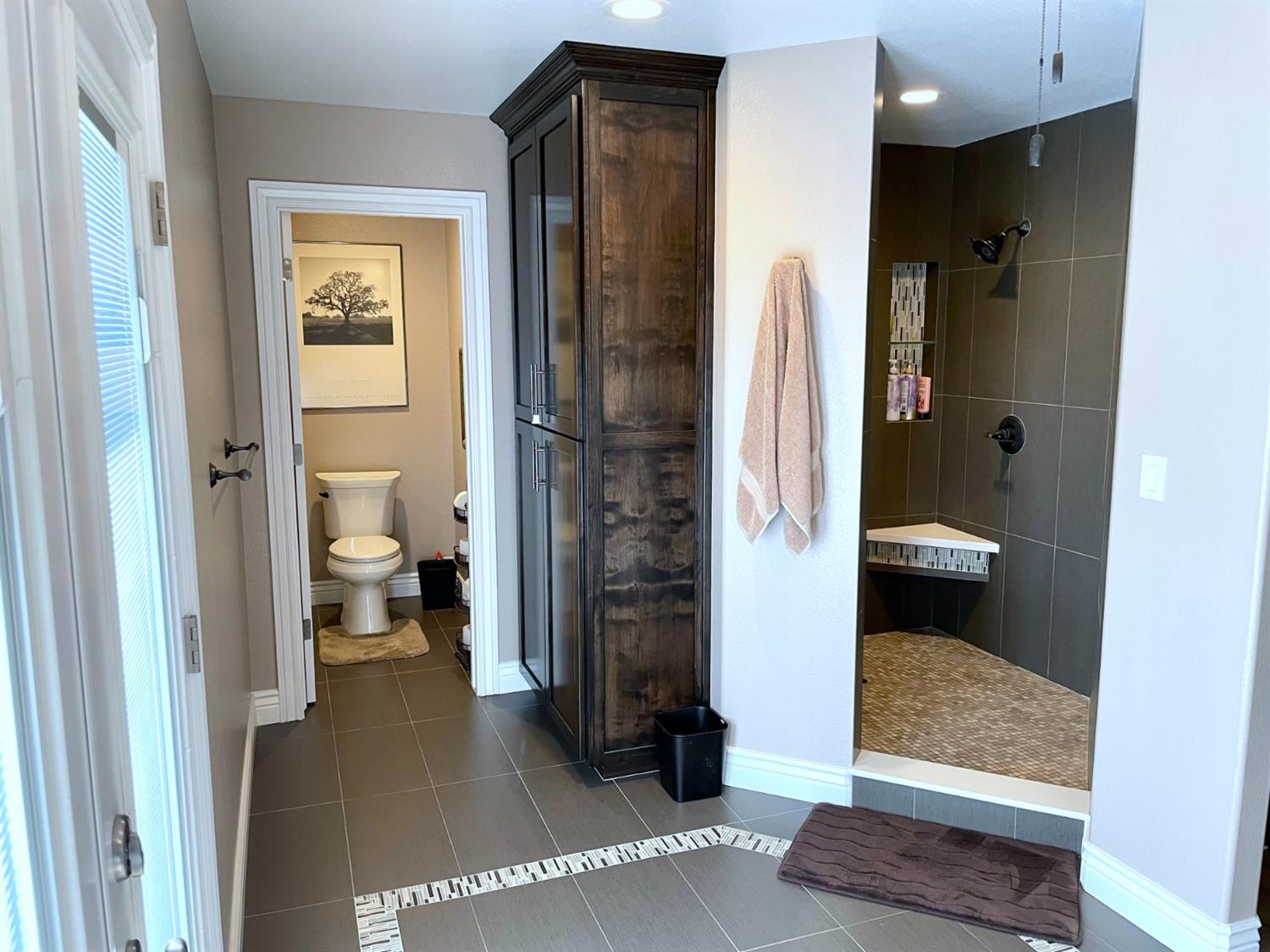 16760 West Hanford Armona Road Lemoore, CA 93245 - Photo 28 of 36 a bathroom with a glass door shower