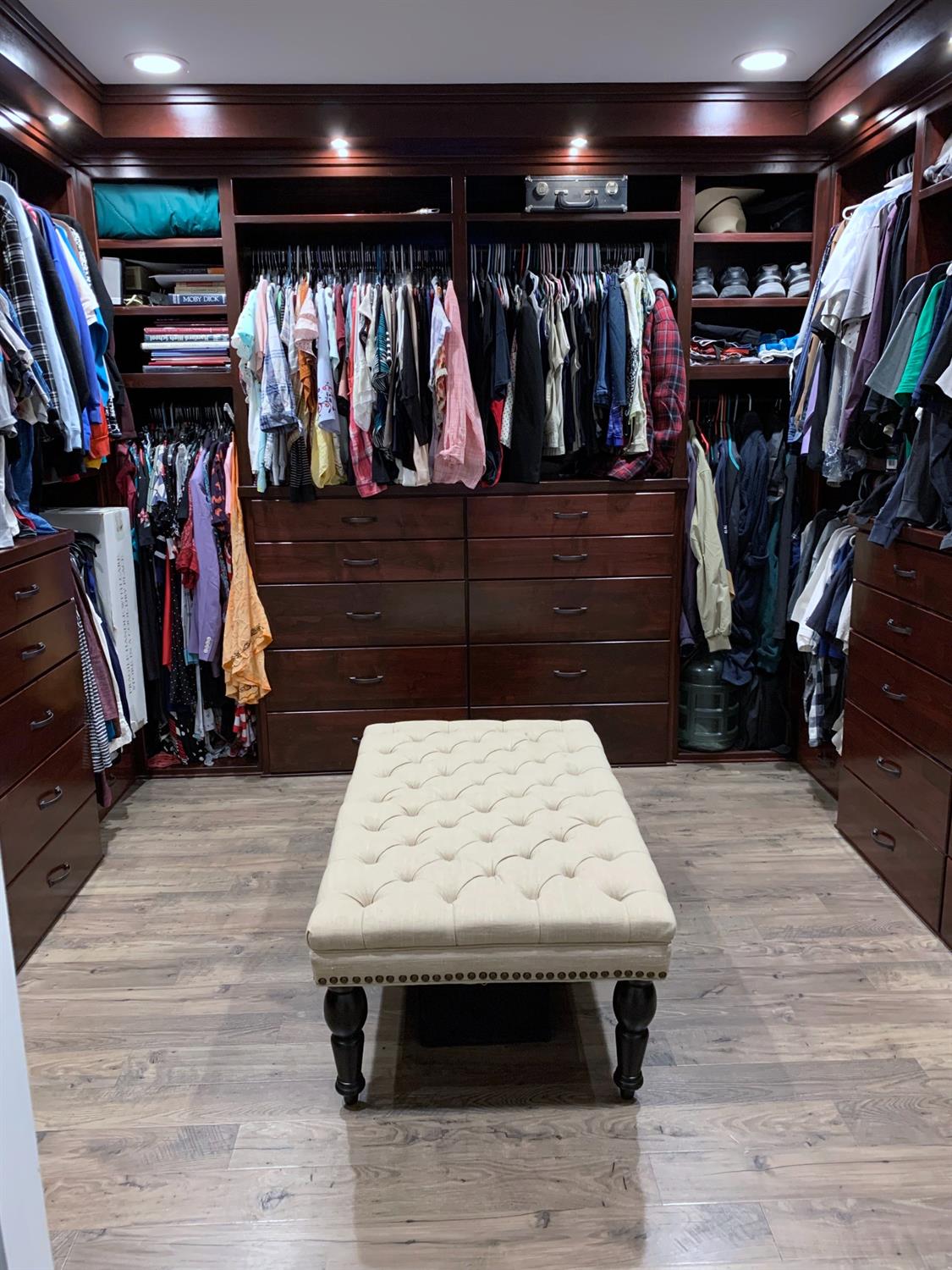 16760 West Hanford Armona Road Lemoore, CA 93245 - Photo 29 of 36 a view of walk in closet with clothes and shoes