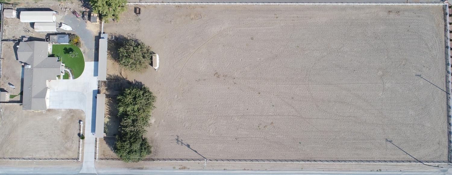 16760 West Hanford Armona Road Lemoore, CA 93245 - Photo 4 of 36 view of a potted plant in front of door