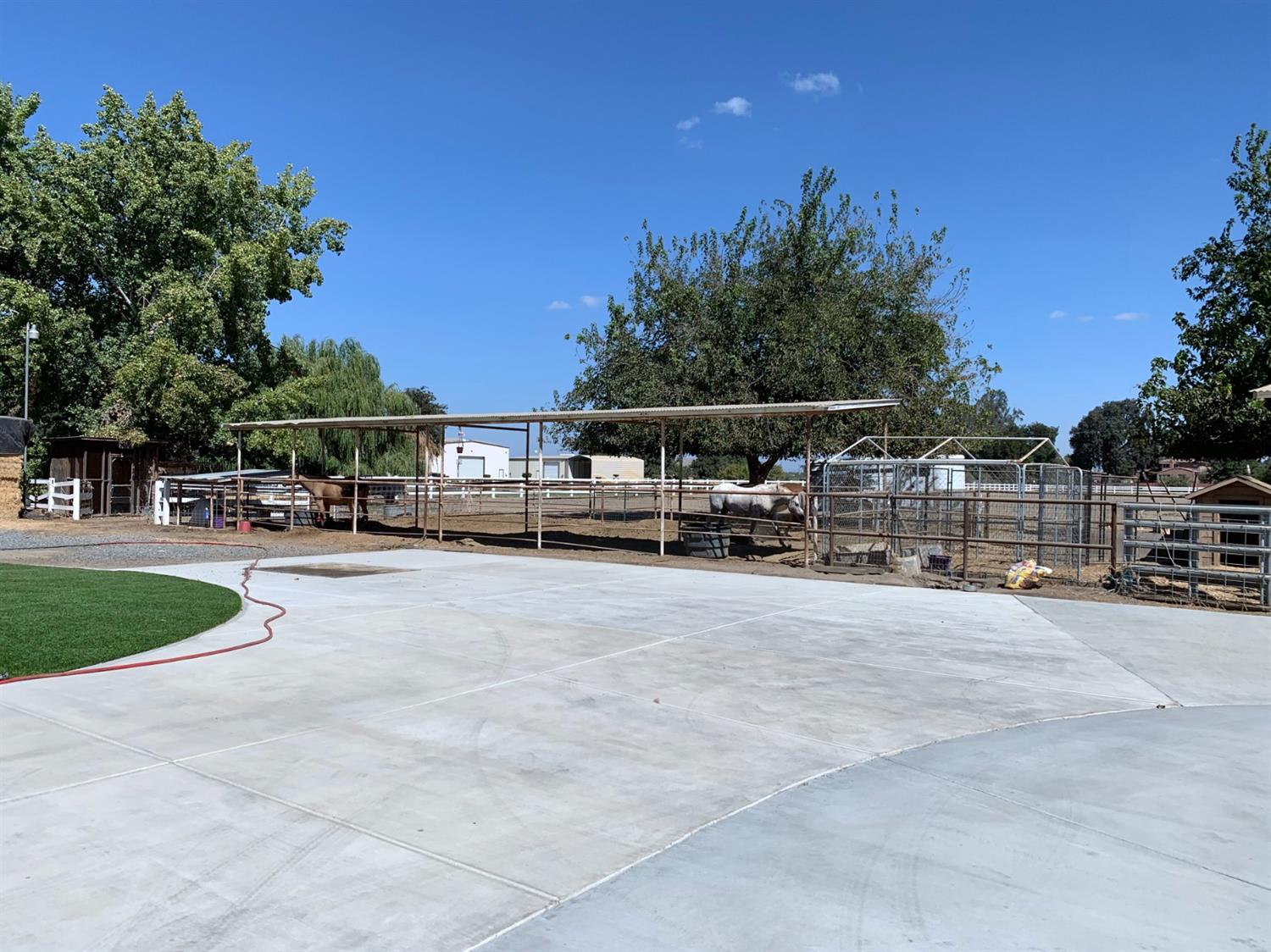 16760 West Hanford Armona Road Lemoore, CA 93245 - Photo 34 of 36 a swimming pool with outdoor seating and yard
