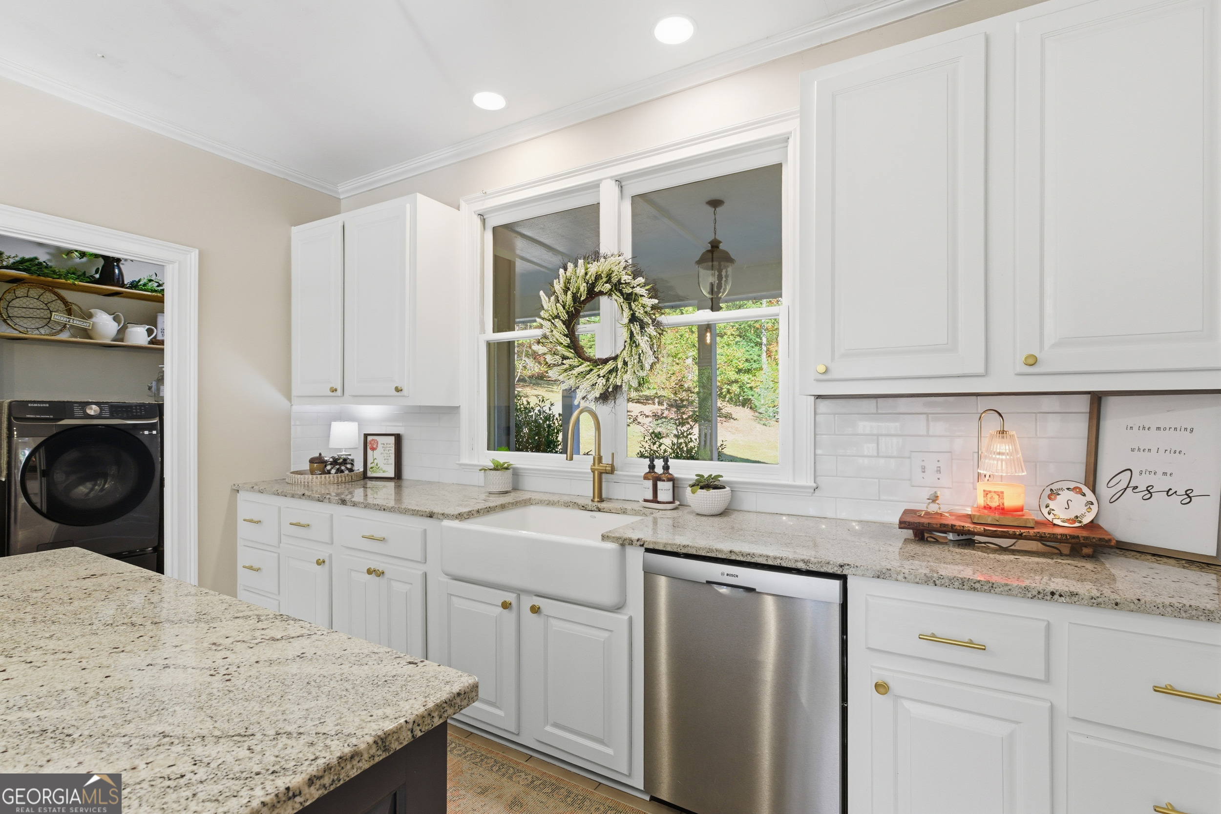 478 Chattahoochee Glen Road Clarkesville, GA 30523 - Photo 11 of 58 a kitchen with stainless steel appliances granite countertop a sink a stove and cabinets