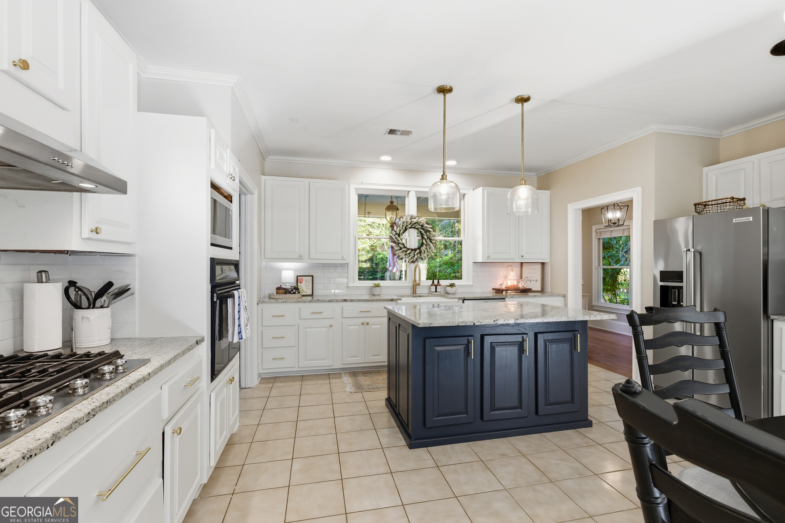 478 Chattahoochee Glen Road Clarkesville, GA 30523 - Photo 12 of 58 a kitchen with a sink stove and cabinets