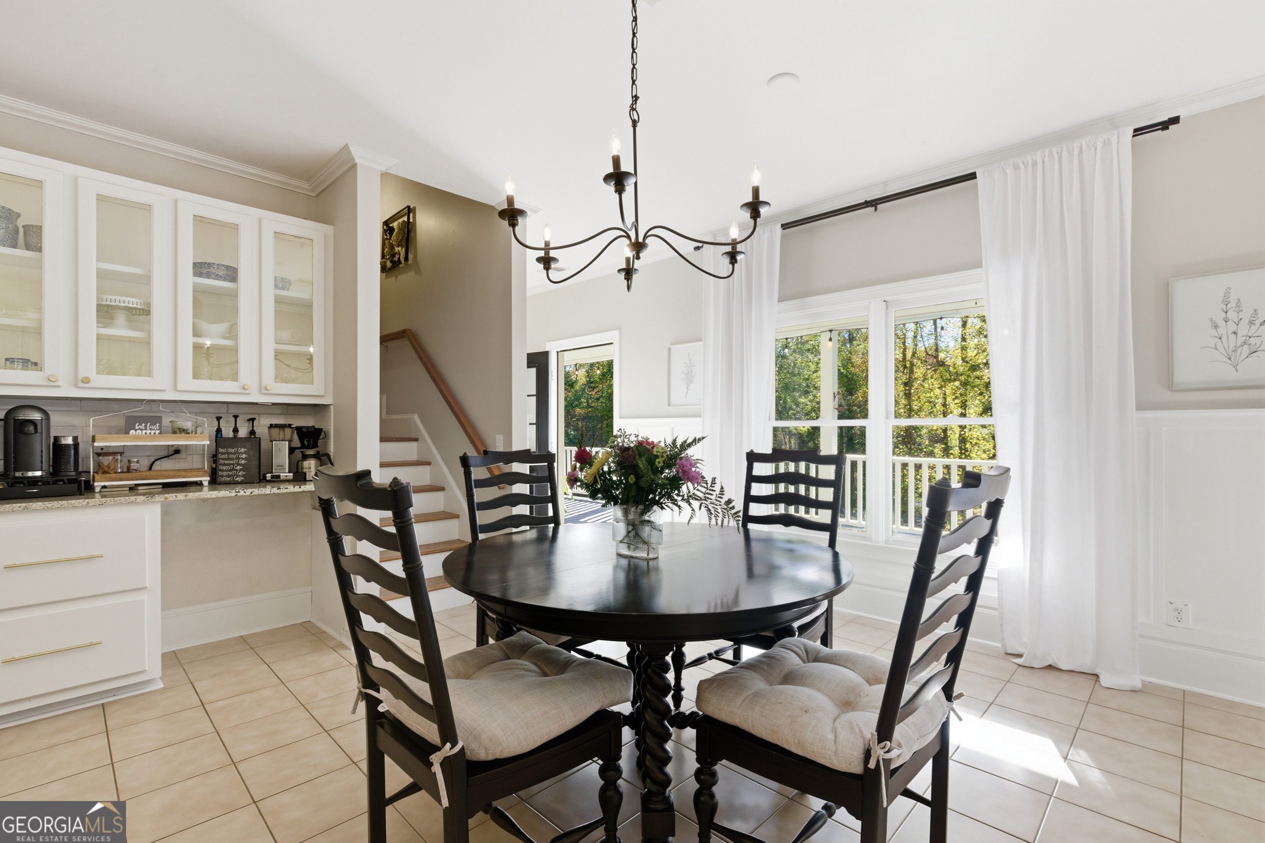 478 Chattahoochee Glen Road Clarkesville, GA 30523 - Photo 15 of 58 a view of a dining room with furniture window and outside view