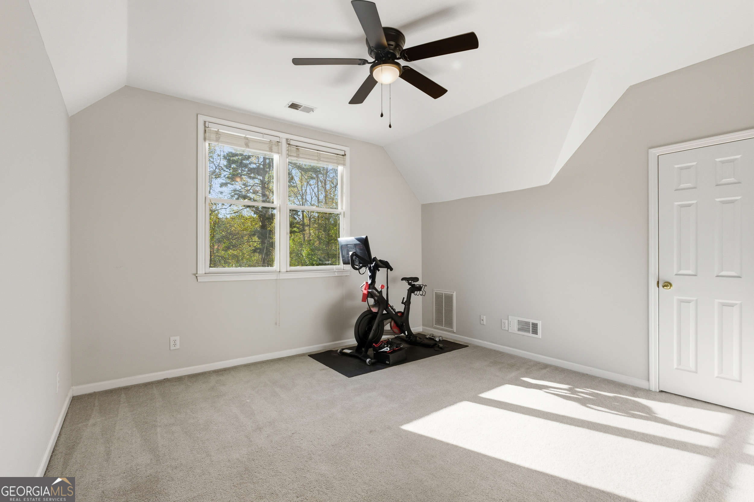 478 Chattahoochee Glen Road Clarkesville, GA 30523 - Photo 28 of 58 a room with gym equipment and windows