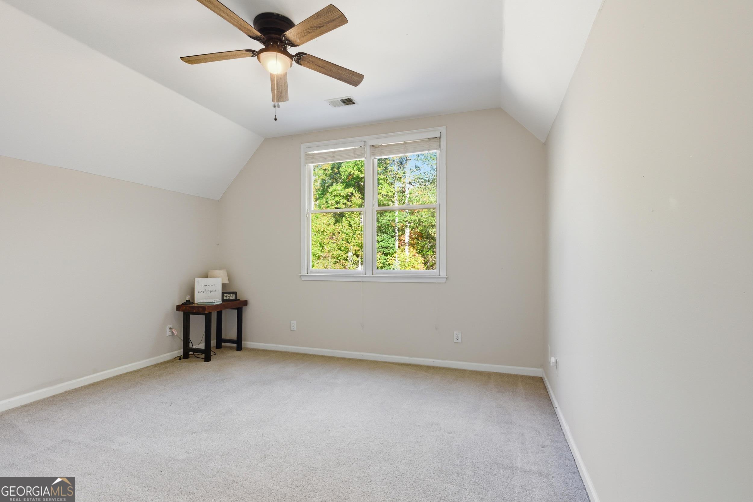 478 Chattahoochee Glen Road Clarkesville, GA 30523 - Photo 30 of 58 an empty room with a window and a ceiling fan