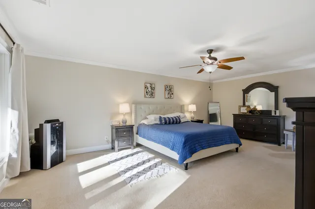 a building outdoor space with patio furniture and potted plants