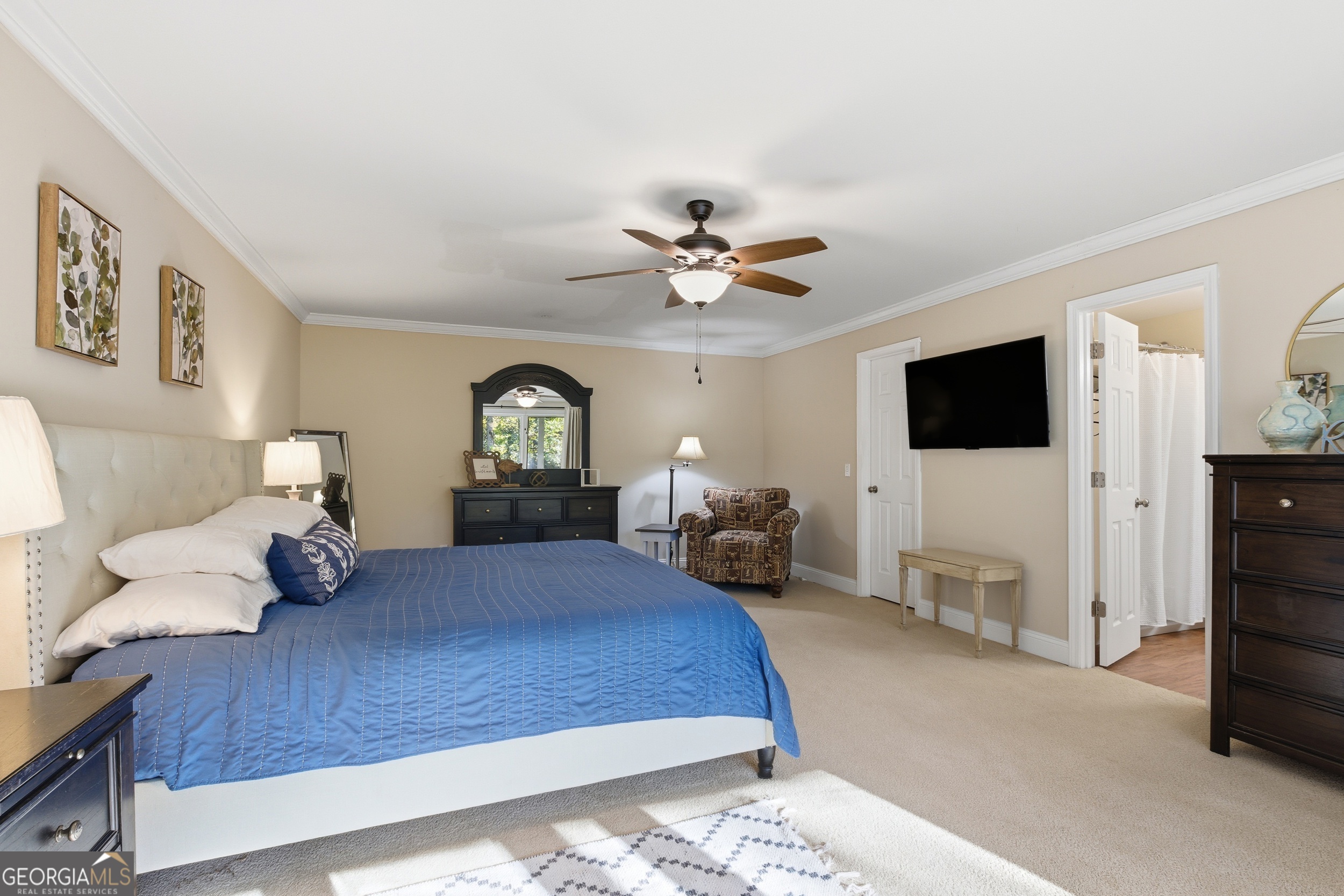 478 Chattahoochee Glen Road Clarkesville, GA 30523 - Photo 37 of 58 a bedroom with a bed window and a flat screen tv