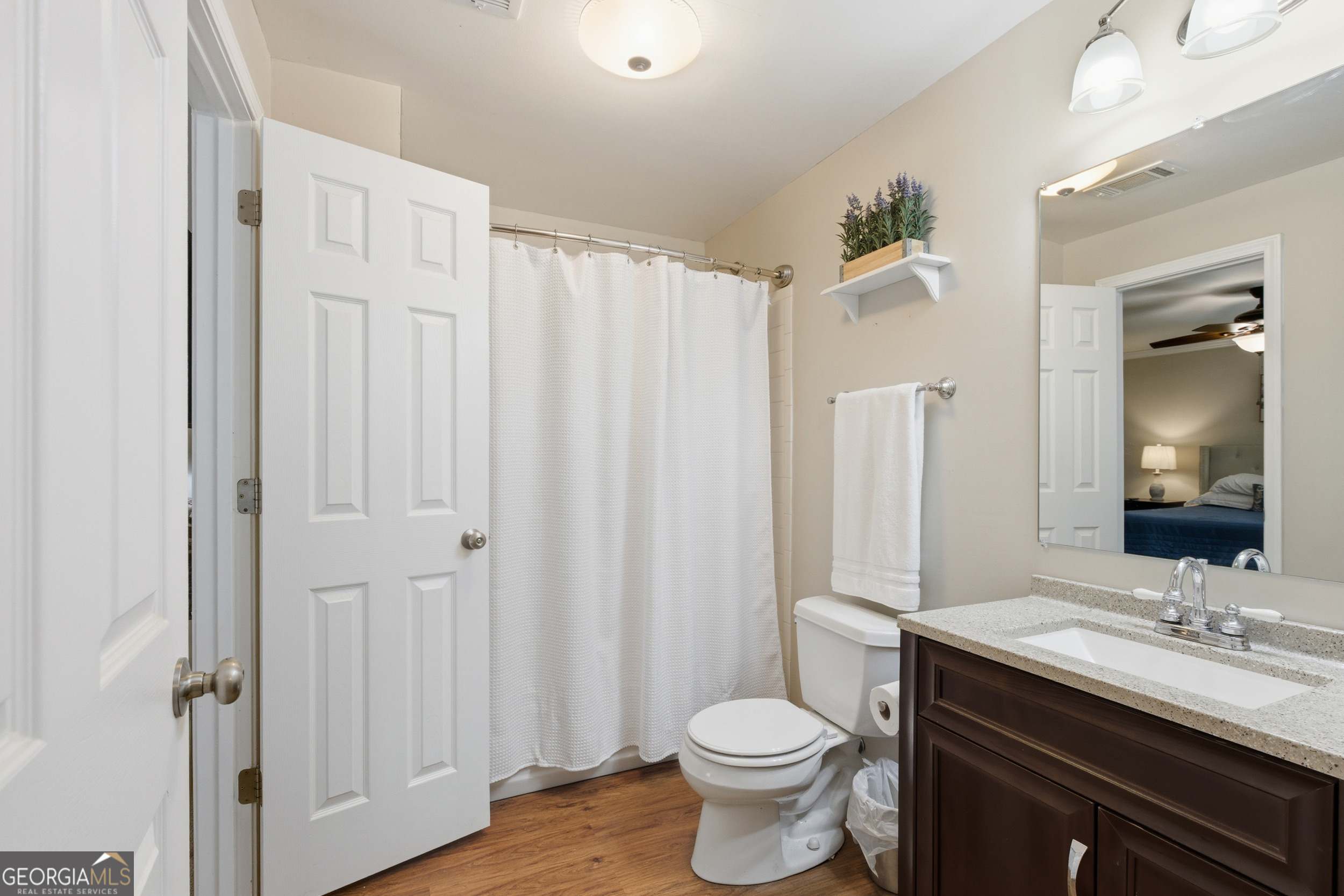 478 Chattahoochee Glen Road Clarkesville, GA 30523 - Photo 38 of 58 a bathroom with a double vanity sink toilet and shower