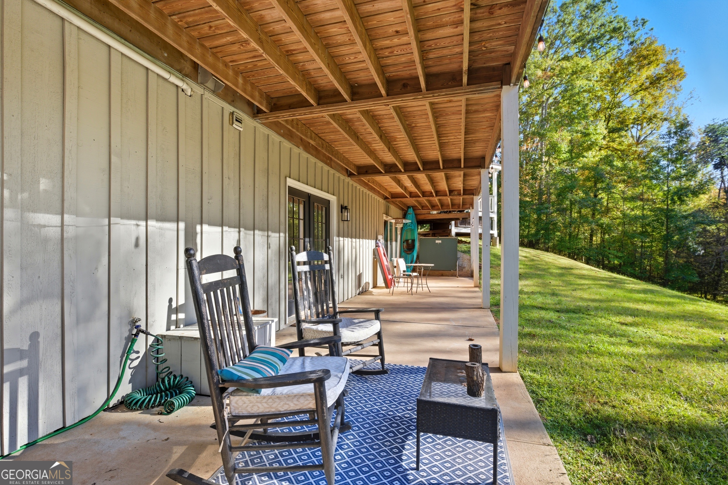 478 Chattahoochee Glen Road Clarkesville, GA 30523 - Photo 39 of 58 a building outdoor space with patio furniture and potted plants