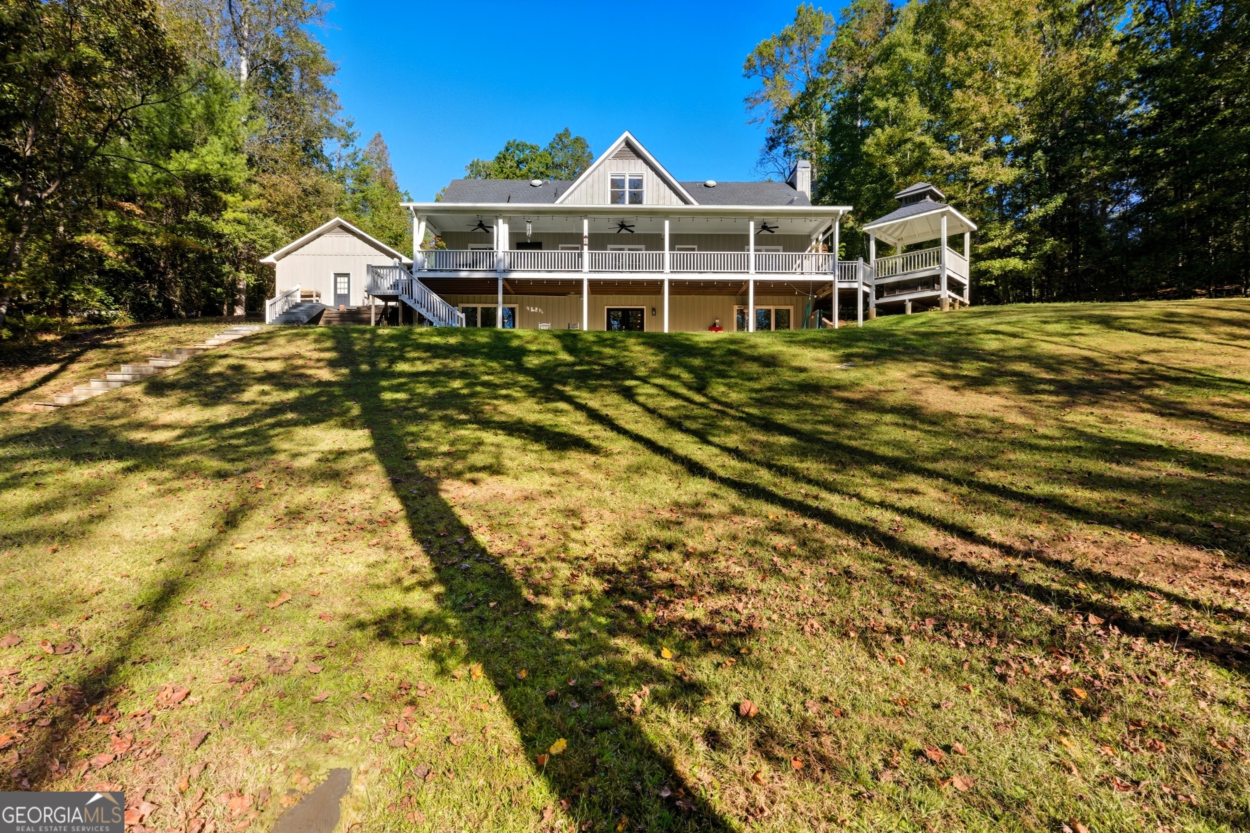 478 Chattahoochee Glen Road Clarkesville, GA 30523 - Photo 40 of 58 a view of a house with a yard