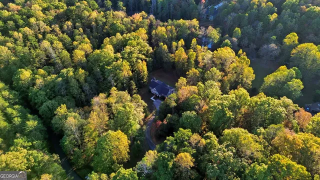 a picture of a bathroom with a shower