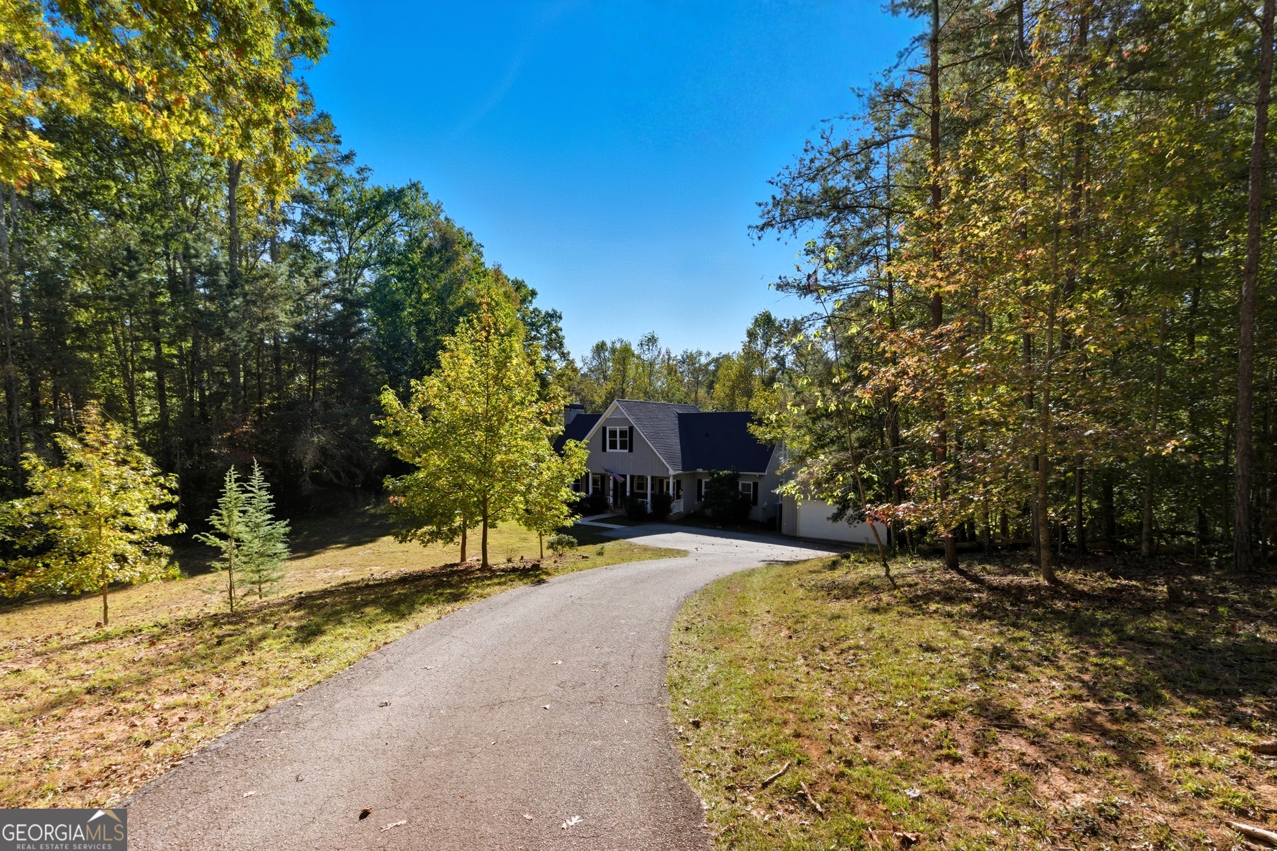 478 Chattahoochee Glen Road Clarkesville, GA 30523 - Photo 7 of 58 a view of a house with a yard