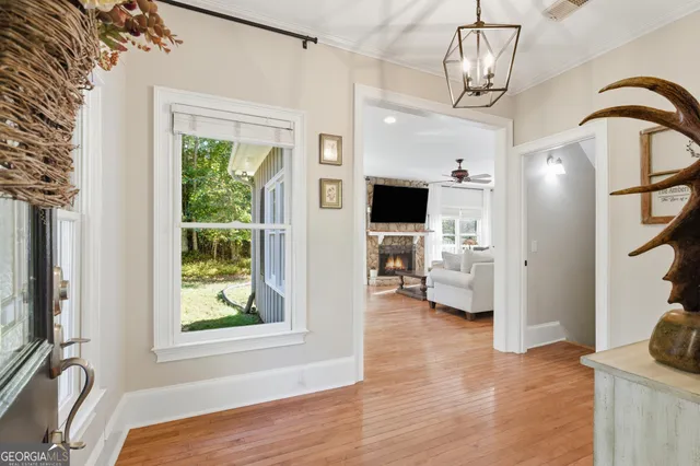 a view of living room with furniture and a window