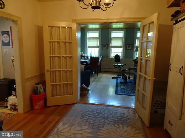 a view of a livingroom with furniture and front door