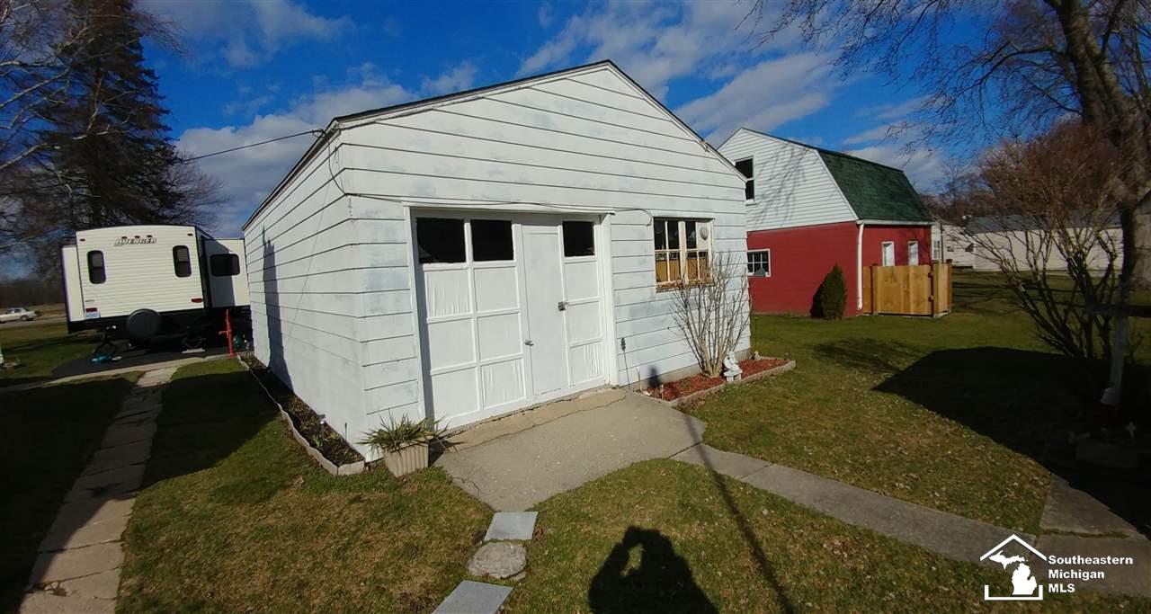 27233 Sibley Road Romulus, MI 48174 - Photo 19 of 40 Rear Garage Door