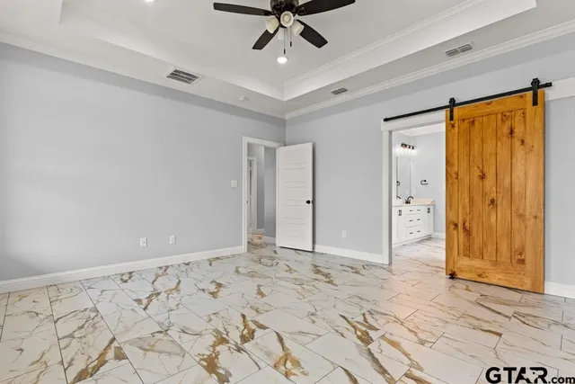 a bathroom with a double vanity sink and mirror