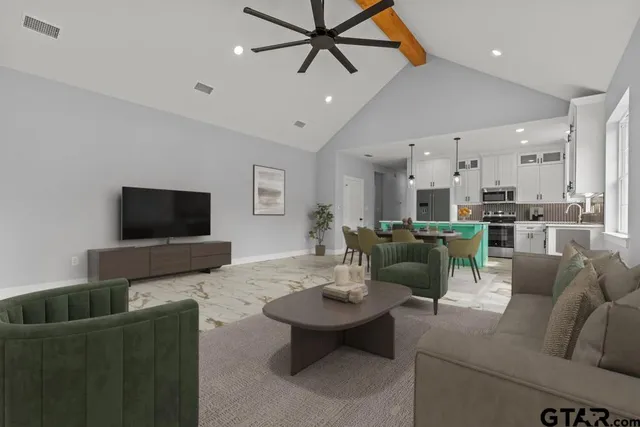 a living room with furniture and a flat screen tv