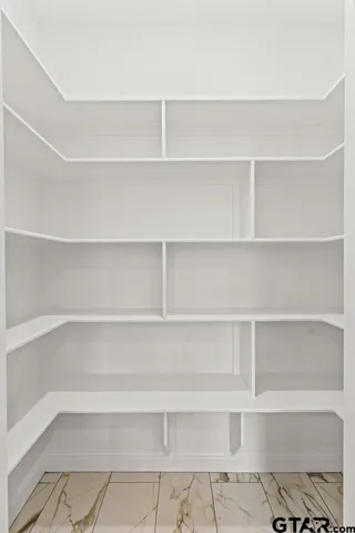 a house with trees in the background