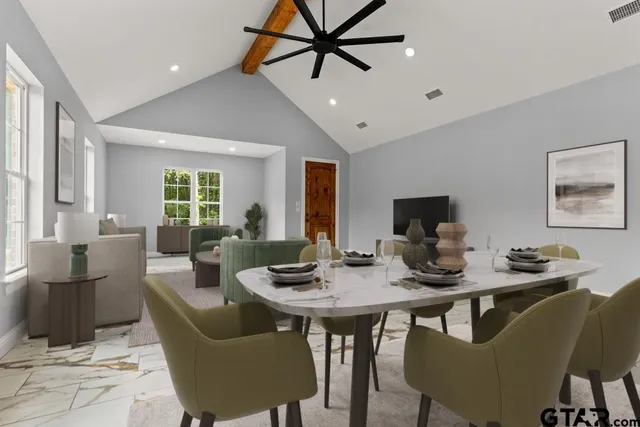 a view of a dining room with furniture