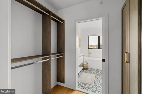 a bathroom with a bathtub and a sink