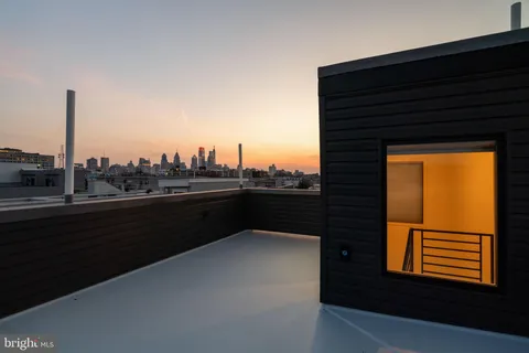 a terrace with a city view